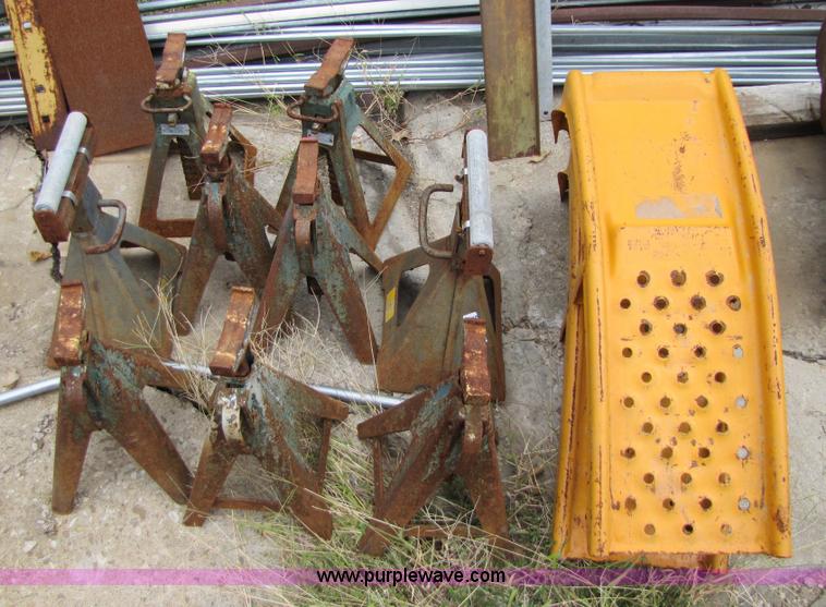 image for item 5317 (9) jack stands and a pair of car ramps