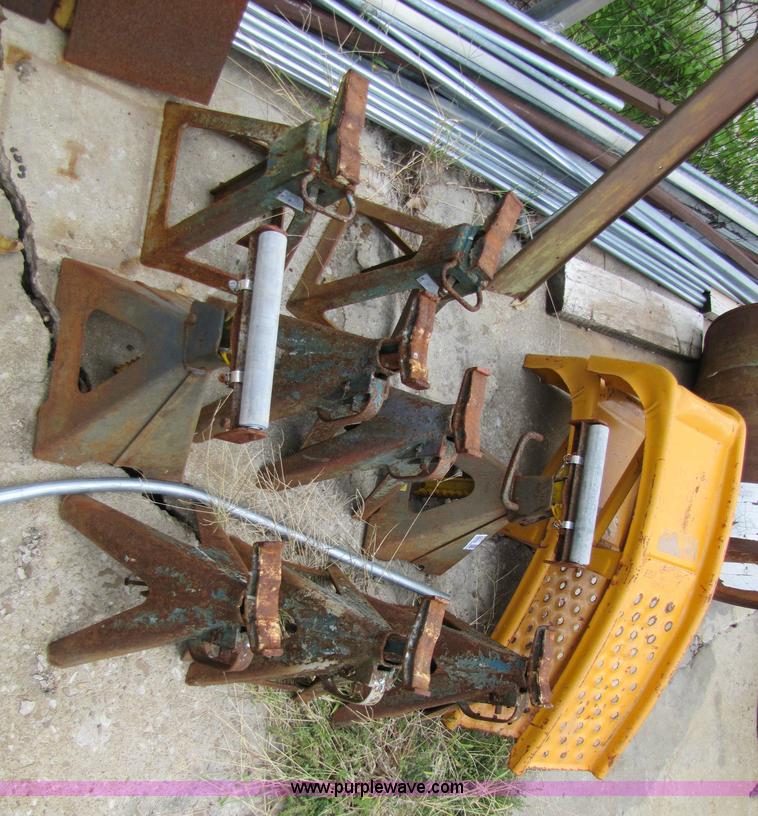 image for item 5317 (9) jack stands and a pair of car ramps