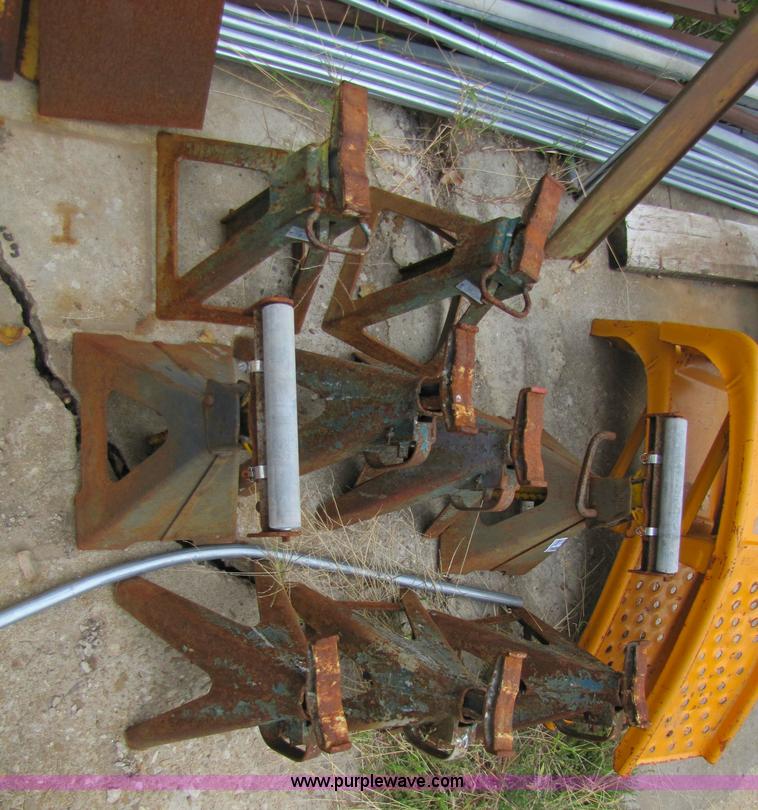image for item 5317 (9) jack stands and a pair of car ramps