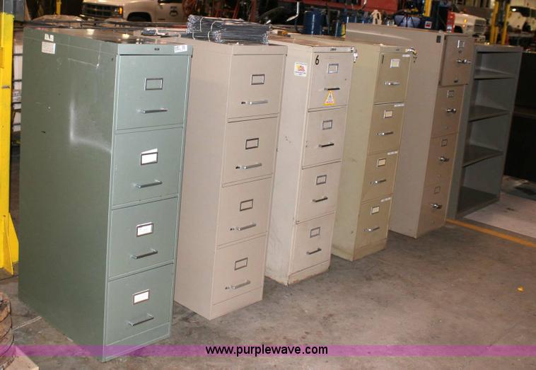 image for item 6461 (4) four drawer filing cabinets
