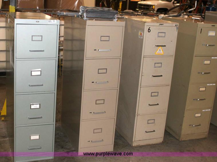 image for item 6461 (4) four drawer filing cabinets