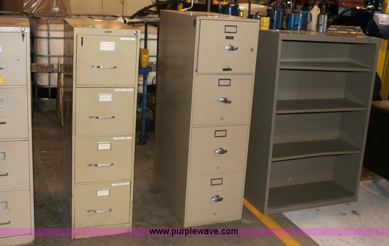 image for item 6461 (4) four drawer filing cabinets