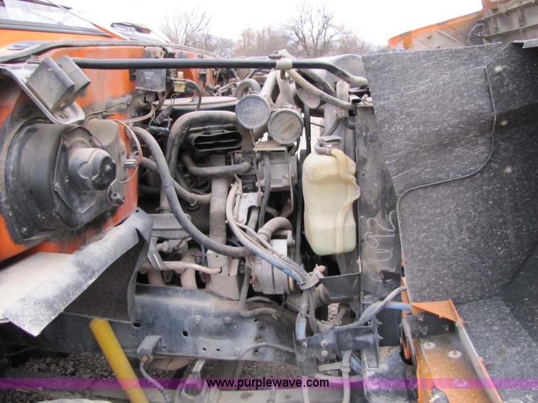 image for item 9330 1988 GMC 700 digger truck