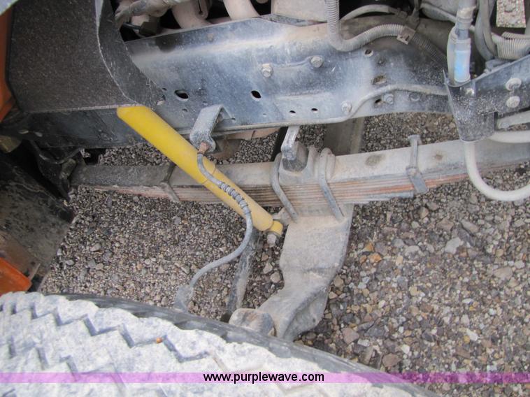 image for item 9330 1988 GMC 700 digger truck