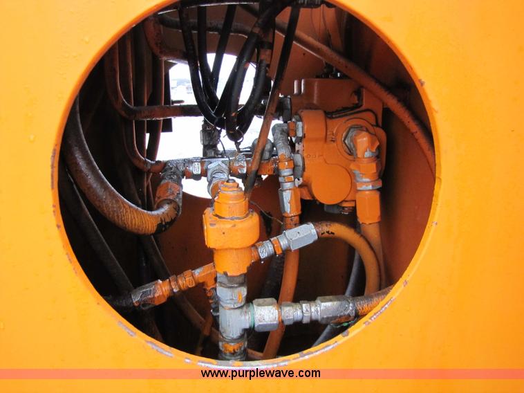 image for item 9330 1988 GMC 700 digger truck