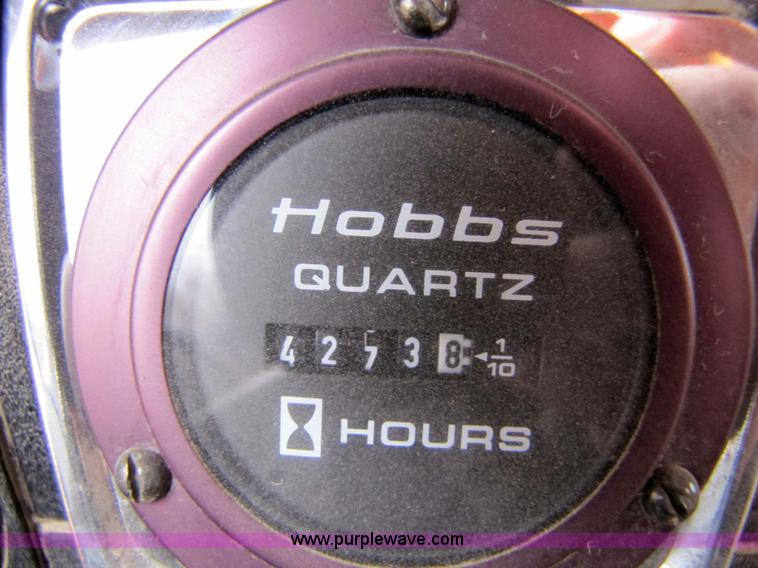 image for item 9330 1988 GMC 700 digger truck