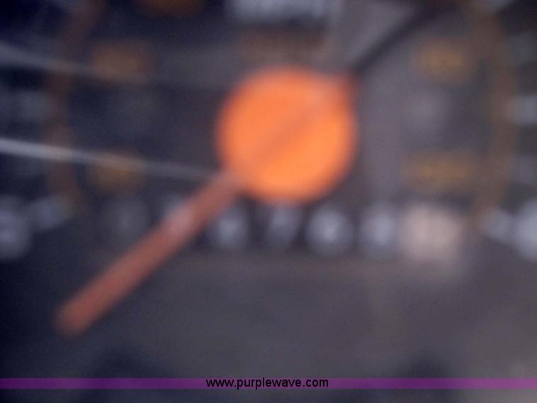 image for item 9330 1988 GMC 700 digger truck