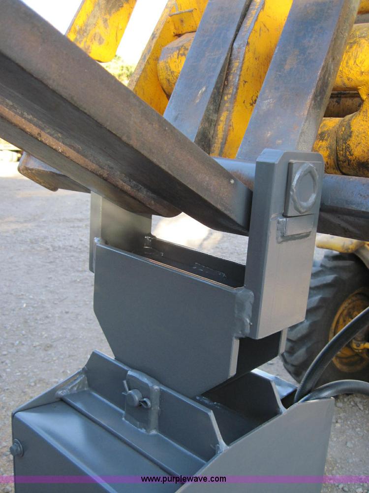 image for item 1958 Lowe Mfg 1650E hydraulic post hole digger