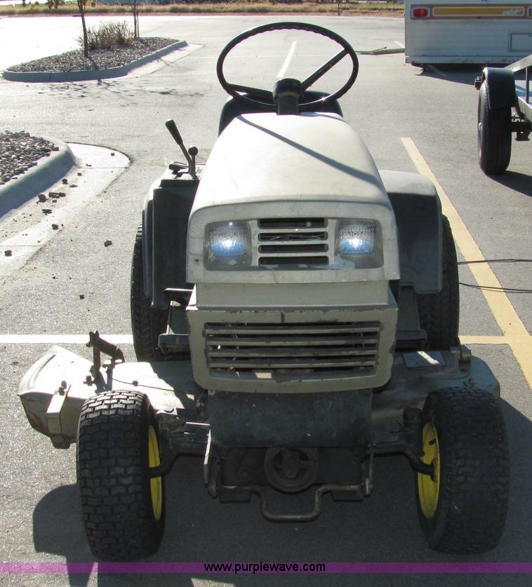 image for item 2306 New Holland S-14 hydrostatic garden tractor with snow blade