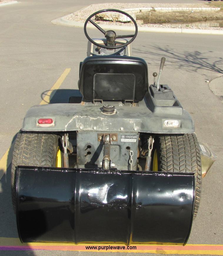 image for item 2306 New Holland S-14 hydrostatic garden tractor with snow blade