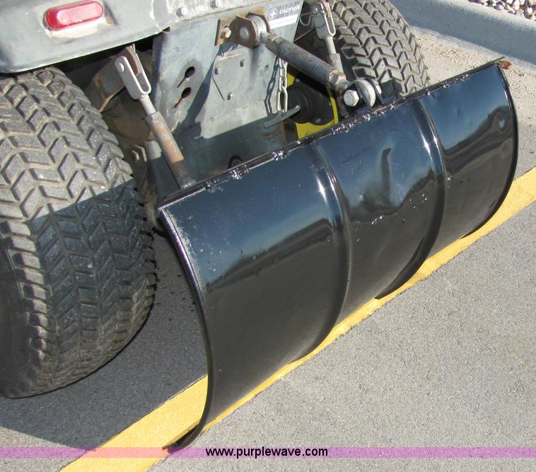 image for item 2306 New Holland S-14 hydrostatic garden tractor with snow blade