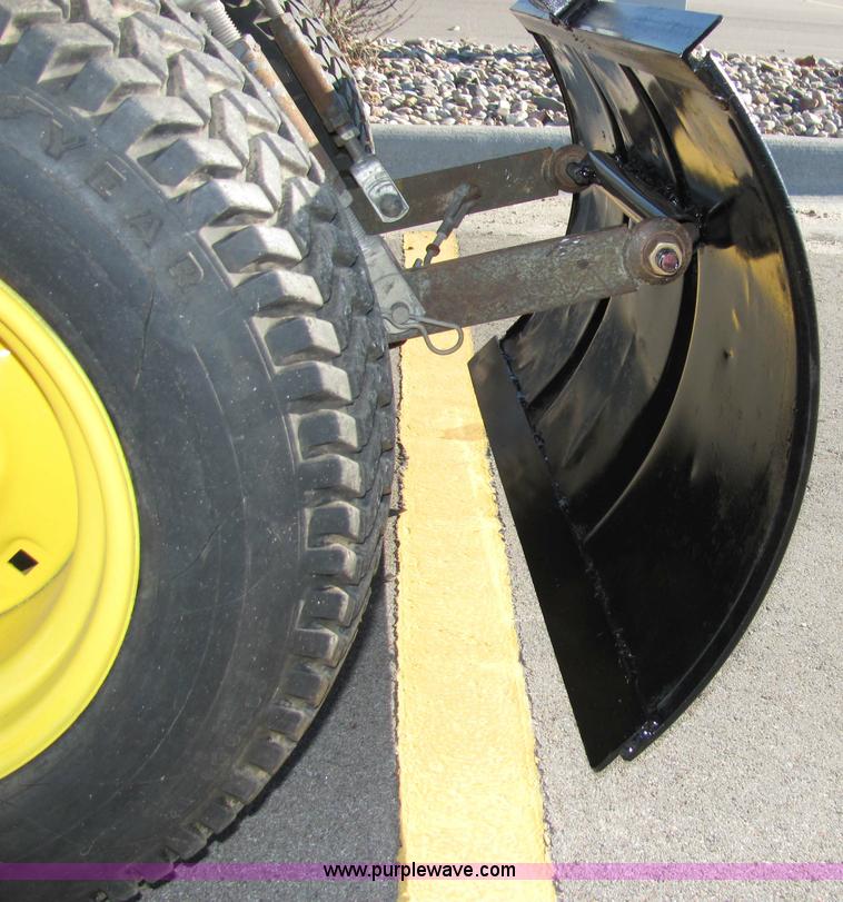 image for item 2306 New Holland S-14 hydrostatic garden tractor with snow blade