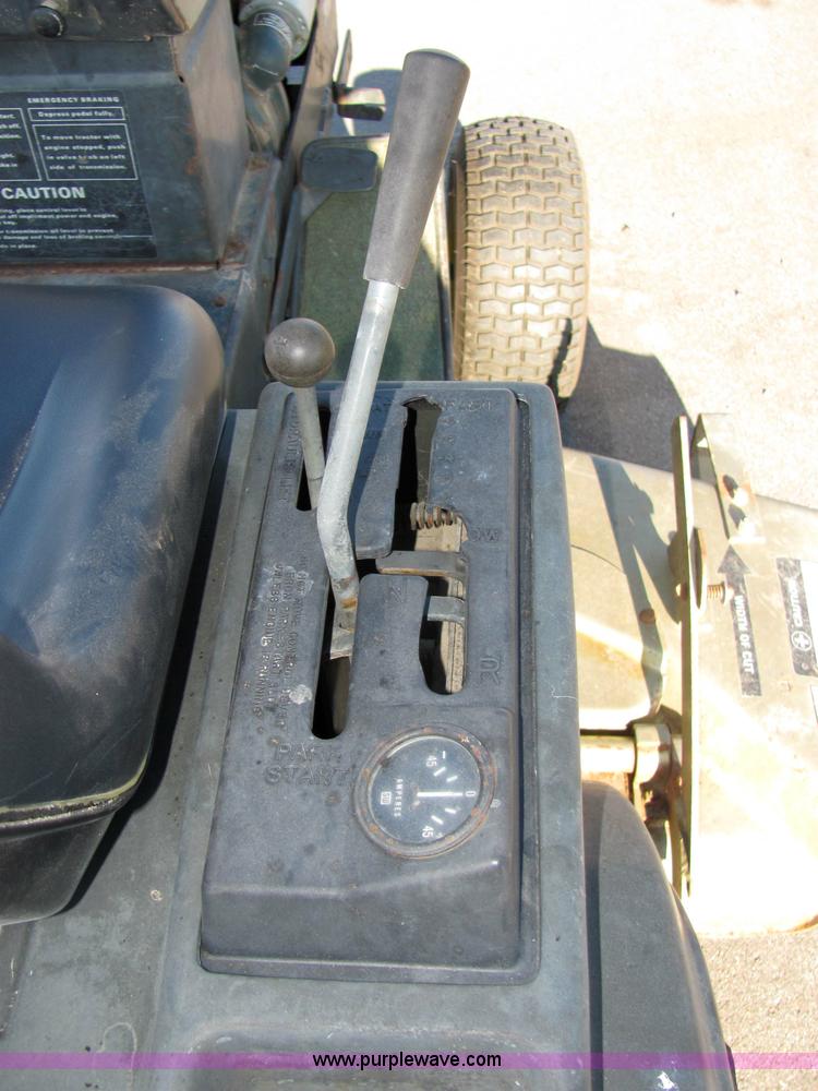 image for item 2306 New Holland S-14 hydrostatic garden tractor with snow blade