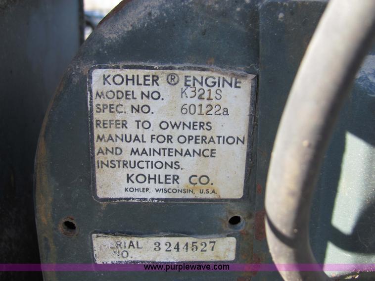 image for item 2306 New Holland S-14 hydrostatic garden tractor with snow blade