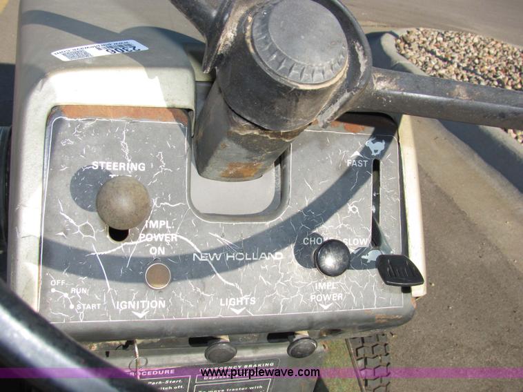 image for item 2306 New Holland S-14 hydrostatic garden tractor with snow blade