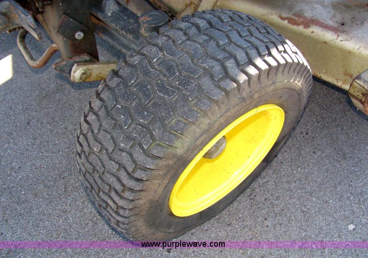 image for item 2306 New Holland S-14 hydrostatic garden tractor with snow blade