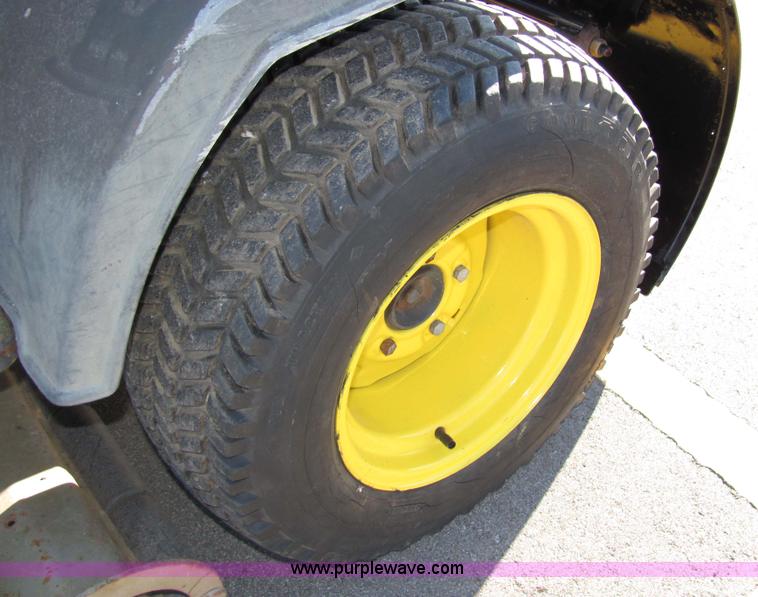 image for item 2306 New Holland S-14 hydrostatic garden tractor with snow blade