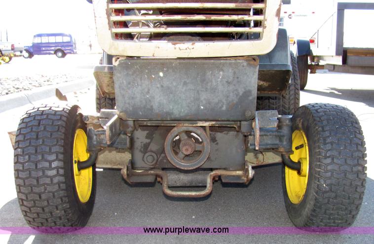 image for item 2306 New Holland S-14 hydrostatic garden tractor with snow blade