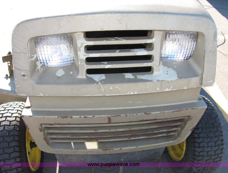 image for item 2306 New Holland S-14 hydrostatic garden tractor with snow blade