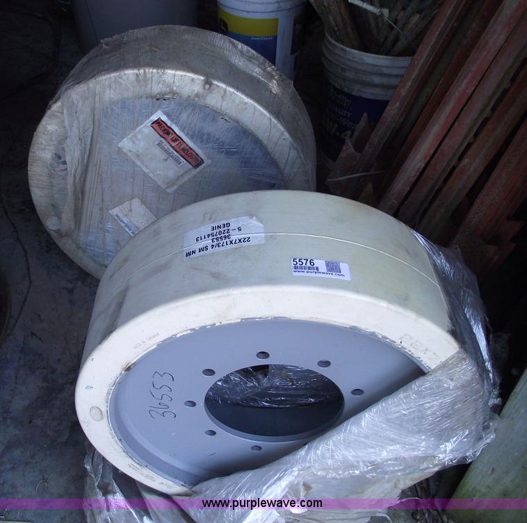 image for item 5576 (2) 22x7x7 3/4 genie boom tires