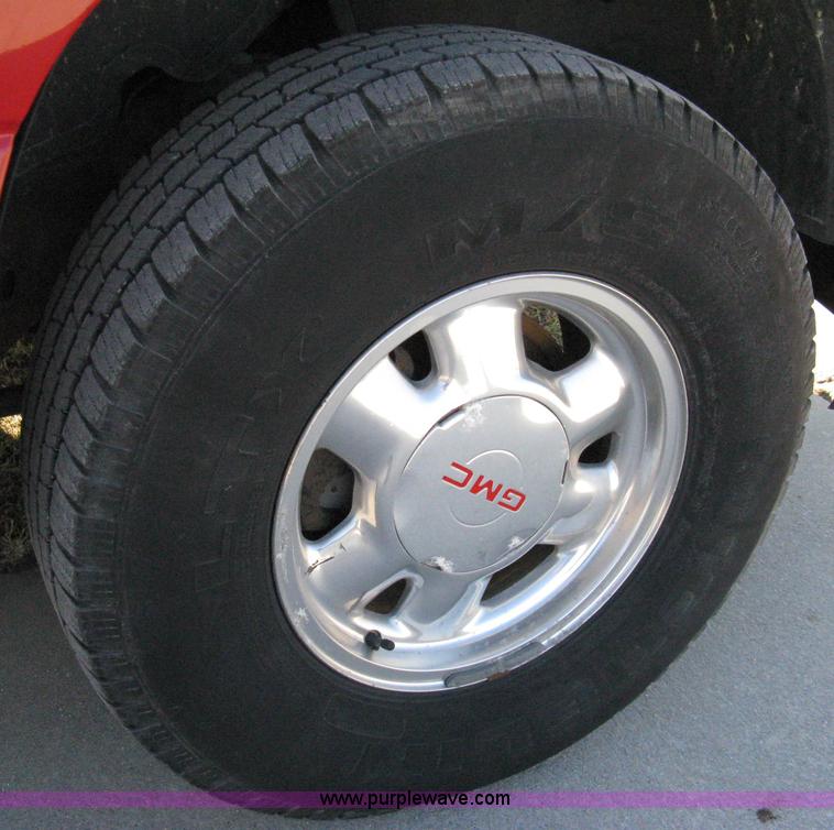 image for item 8065 1999 GMC Sierra K1500 SLT extended cab pickup truck