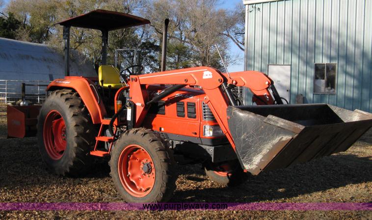 image for item 8069 2003 Kioti DK65 MFWD tractor with loader