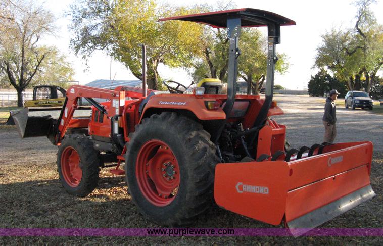 image for item 8069 2003 Kioti DK65 MFWD tractor with loader