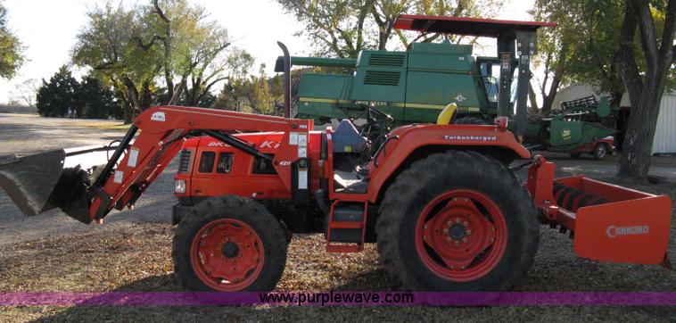 image for item 8069 2003 Kioti DK65 MFWD tractor with loader