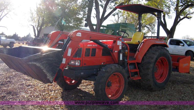 image for item 8069 2003 Kioti DK65 MFWD tractor with loader