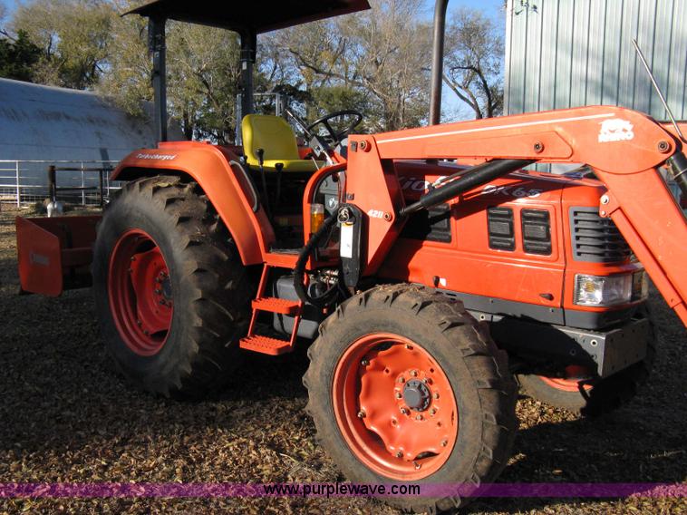 image for item 8069 2003 Kioti DK65 MFWD tractor with loader
