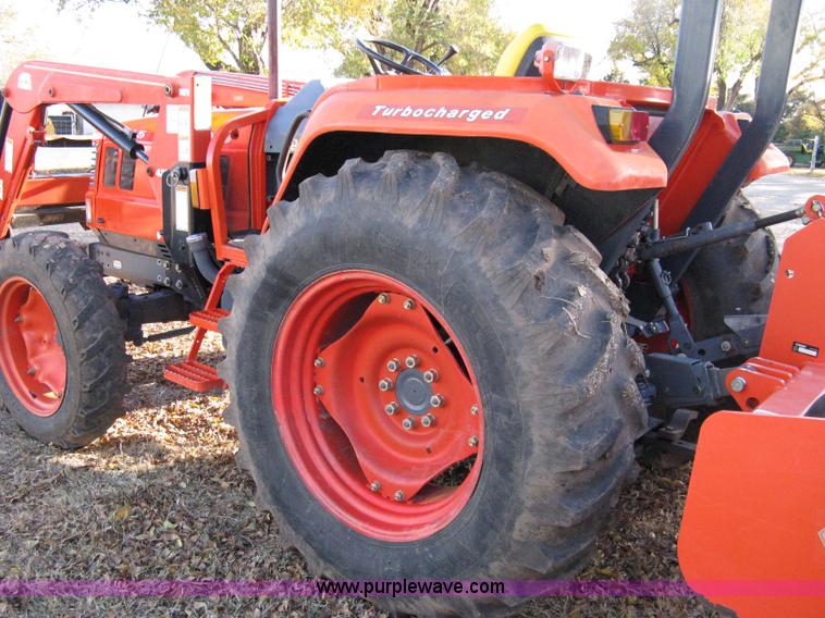 image for item 8069 2003 Kioti DK65 MFWD tractor with loader