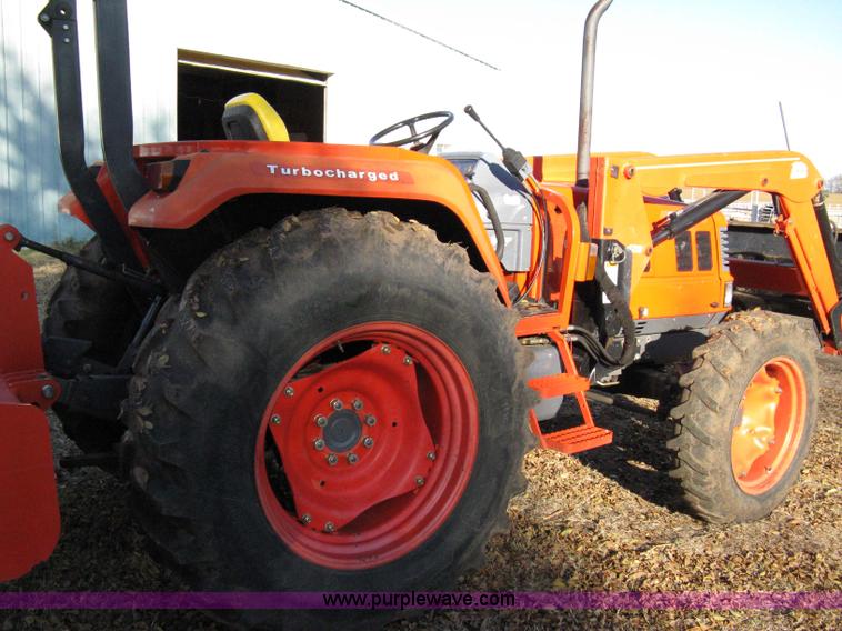 image for item 8069 2003 Kioti DK65 MFWD tractor with loader