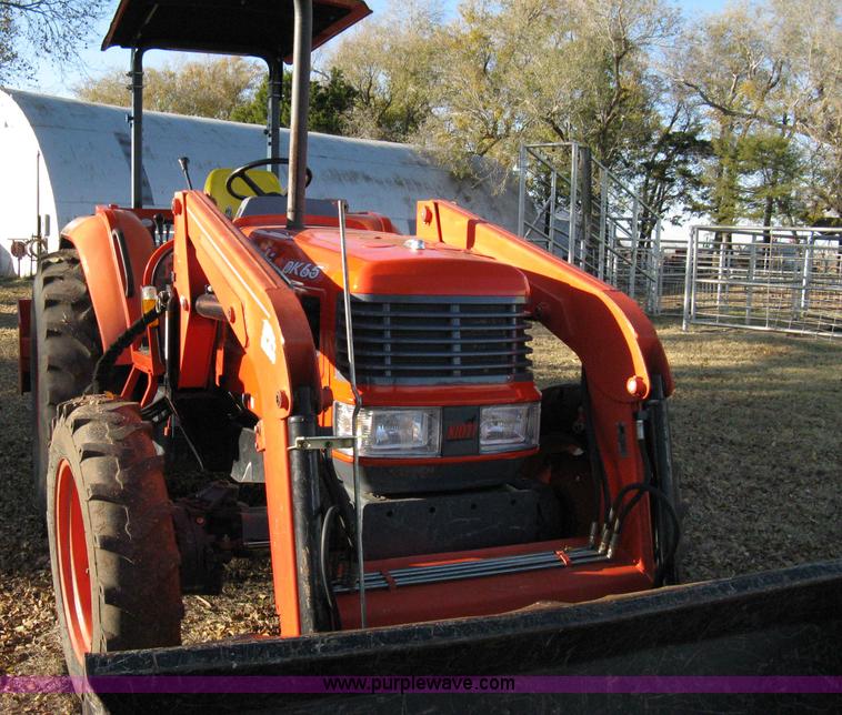 image for item 8069 2003 Kioti DK65 MFWD tractor with loader
