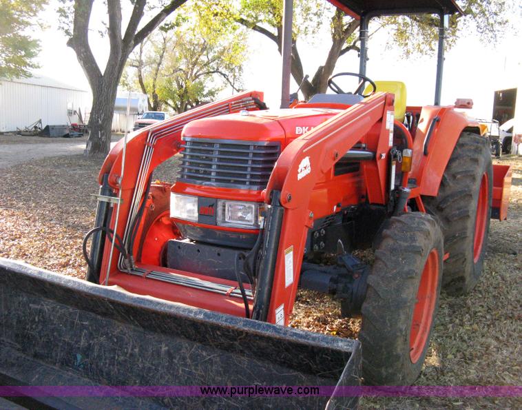 image for item 8069 2003 Kioti DK65 MFWD tractor with loader