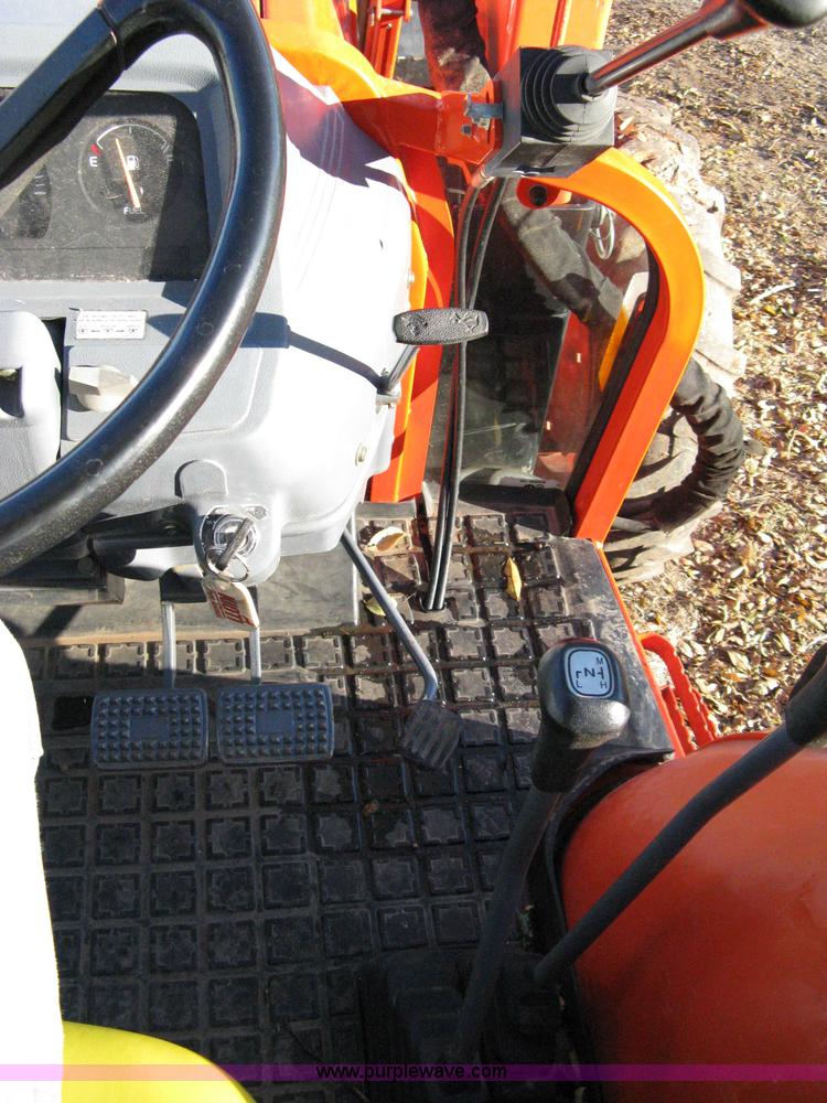 image for item 8069 2003 Kioti DK65 MFWD tractor with loader