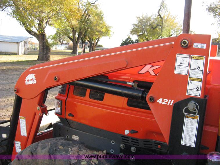 image for item 8069 2003 Kioti DK65 MFWD tractor with loader