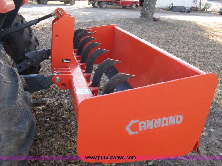 image for item 8069 2003 Kioti DK65 MFWD tractor with loader