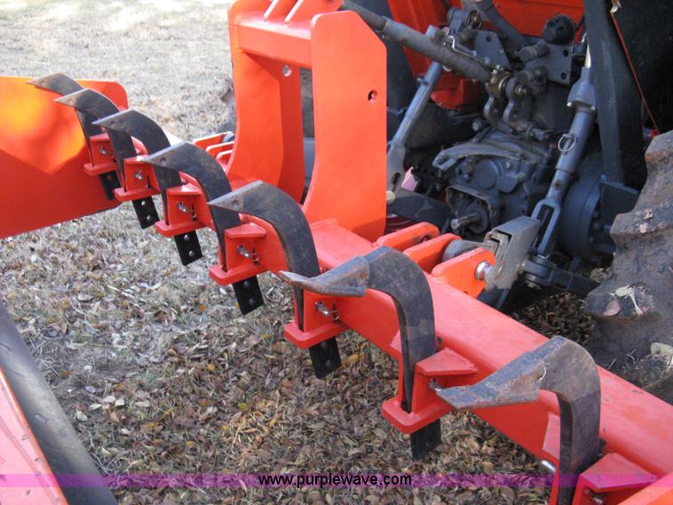 image for item 8069 2003 Kioti DK65 MFWD tractor with loader