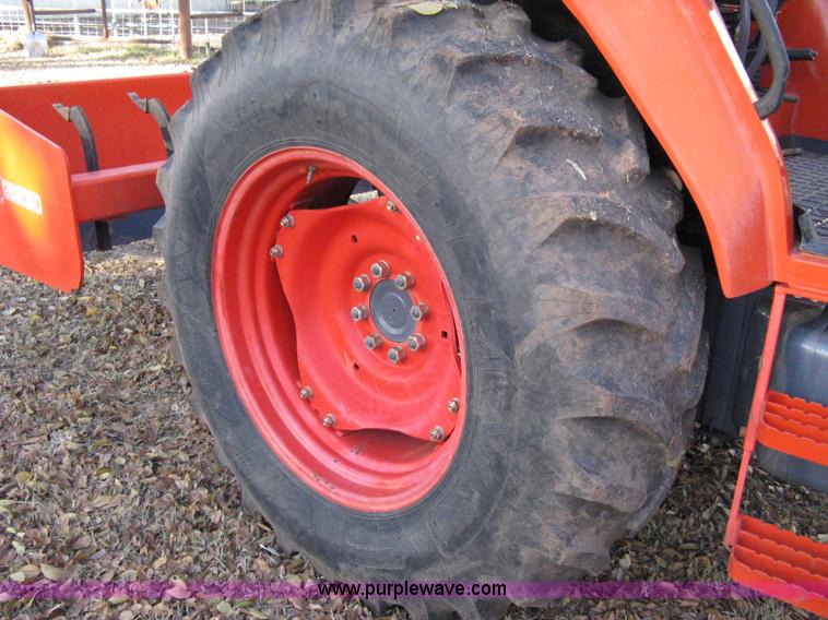 image for item 8069 2003 Kioti DK65 MFWD tractor with loader