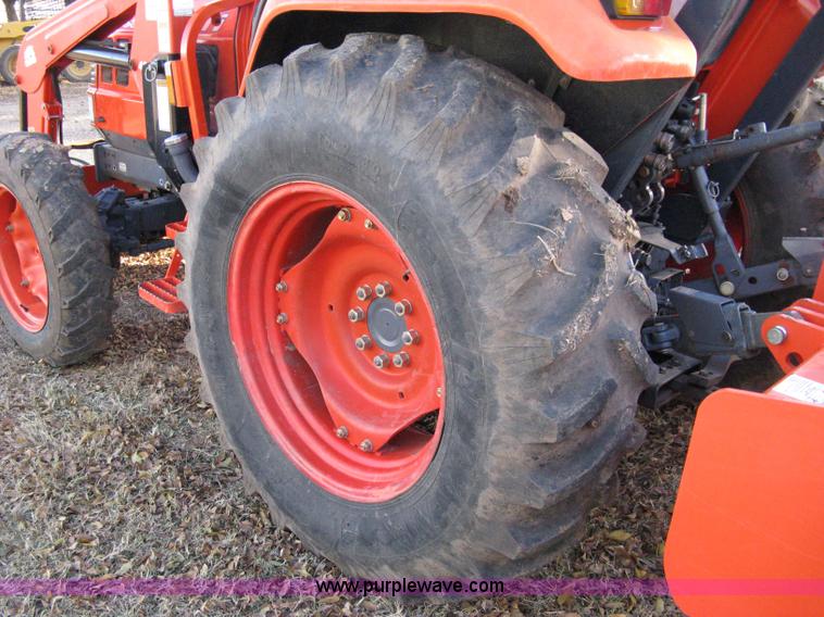 image for item 8069 2003 Kioti DK65 MFWD tractor with loader