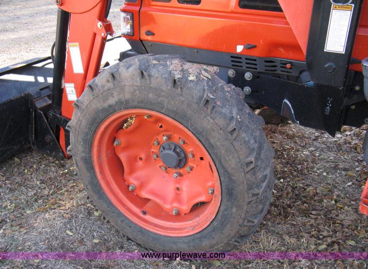 image for item 8069 2003 Kioti DK65 MFWD tractor with loader