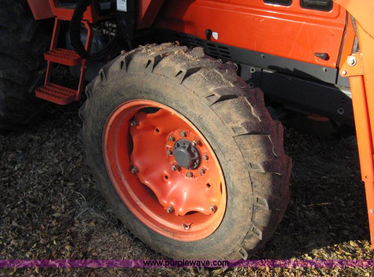 image for item 8069 2003 Kioti DK65 MFWD tractor with loader