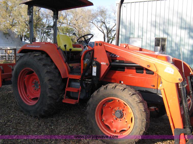 image for item 8069 2003 Kioti DK65 MFWD tractor with loader