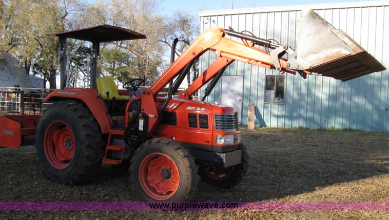 image for item 8069 2003 Kioti DK65 MFWD tractor with loader