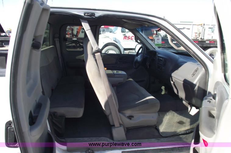 image for item 5428 2000 Ford F150 XLT extended cap pickup truck
