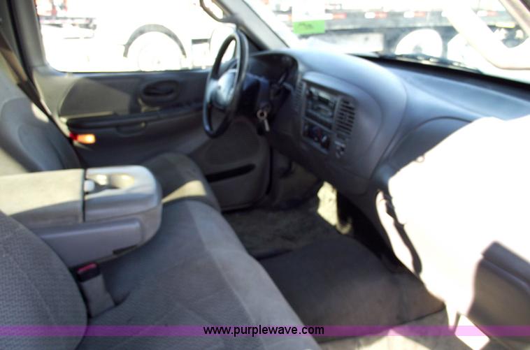 image for item 5428 2000 Ford F150 XLT extended cap pickup truck