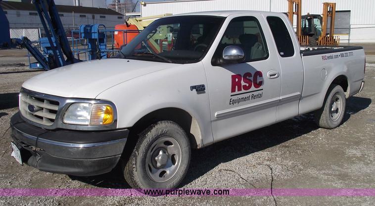 image for item 5437 2002 Ford F150 XLT extended cab pickup truck