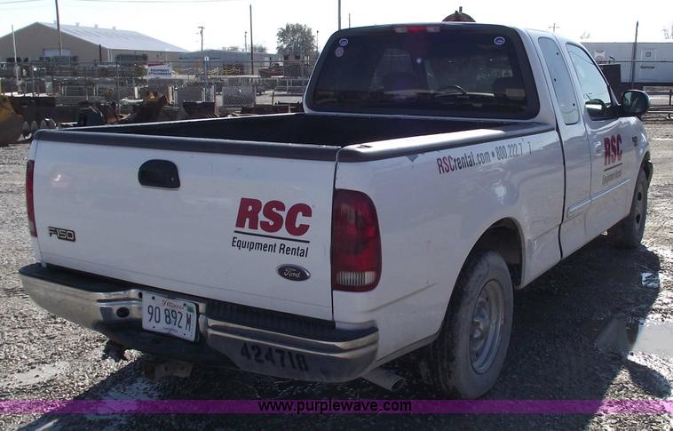 image for item 5437 2002 Ford F150 XLT extended cab pickup truck