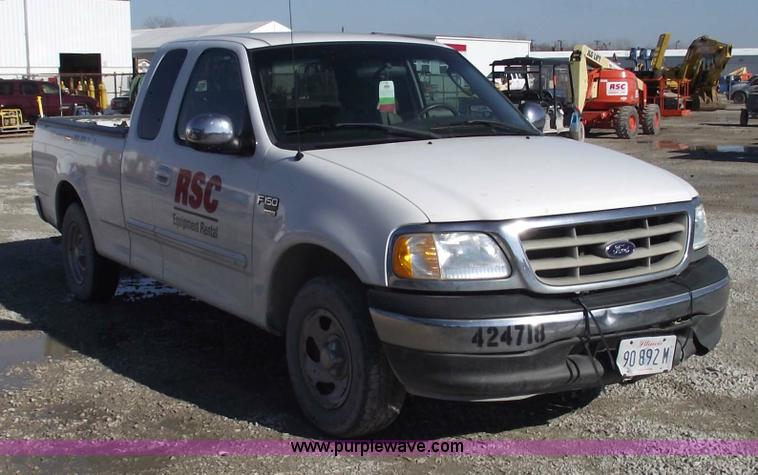 image for item 5437 2002 Ford F150 XLT extended cab pickup truck
