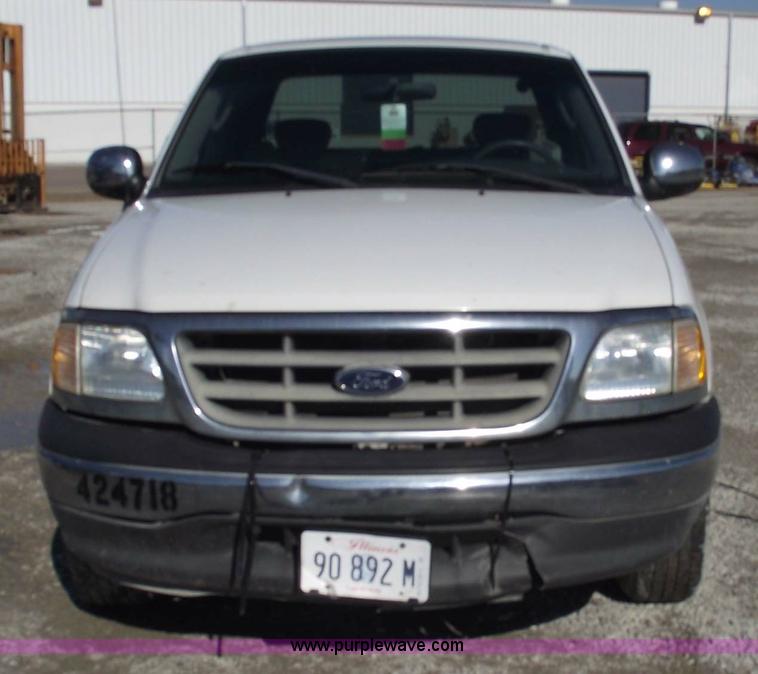 image for item 5437 2002 Ford F150 XLT extended cab pickup truck